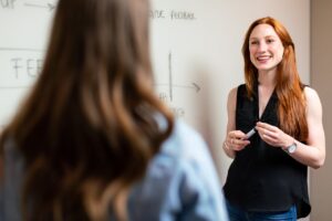 Female Engineer Holding Presentation